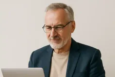 50+ candidate preparing a job application on a laptop